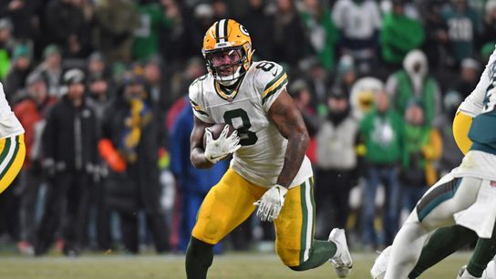 Green Bay Packers running back Josh Jacobs runs with the football during the 2024 NFL Playoffs. Green Bay Packers running back Josh Jacobs runs with the football during the 2024 NFL Playoffs.