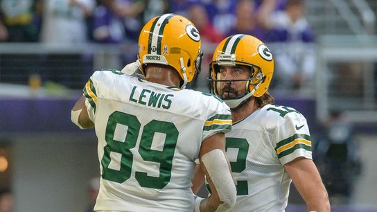 Aaron Rodgers and Marcedes Lewis in action against the Minnesota Vikings during their their time with the Green Bay Packers Aaron Rodgers and Marcedes Lewis in action against the Minnesota Vikings during their their time with the Green Bay Packers