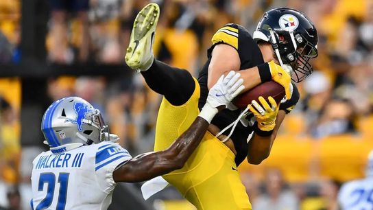 Steelers TE Pat Freiermuth makes a touchdown catch in front of Lions defensive back Tracy Walker in their 2021 preseason game at Heinz Field.