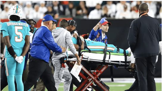Miami Dolphins quarterback Tua Tagovailoa is carted off the feild after suffering a serious head injury on Thursday Night Football. PHOTO: JEFF MORELAND/ICON SPORTSWIRE VIA GETTY
Steelers Miami Dolphins Tua Tagovailoa
