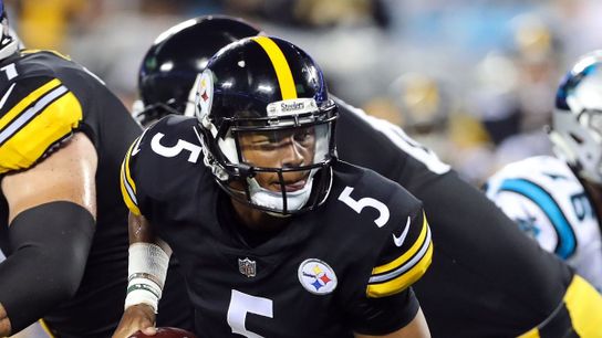 Josh Dobbs hands off against the Panthers – Photo Credit: USA Today
Josh Dobbs hands off against the Panthers – Photo Credit: USA Today