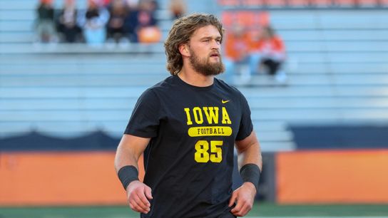 Iowa DT Logan Lee warming up before a game against Illinois on Oct 8, 2022 at Memorial Stadium in Champaign, Ill.