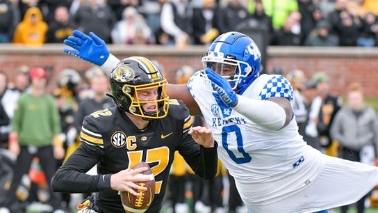 Deone Walker (0) sacking Missouri's quarterback in 2022. Deone Walker (0) sacking Missouri's quarterback in 2022.