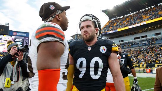 Steelers' TJ Watt meets with Browns' Myles Garrett after a game. Steelers' TJ Watt meets with Browns' Myles Garrett after a game.