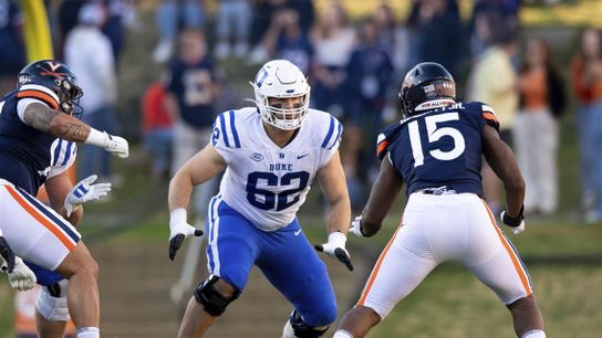 Former Duke offensive lineman Graham Barton (62) takes on a Virginia defender. Steelers' Graham Barton