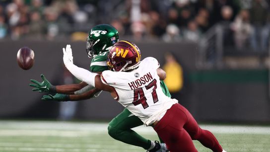 Commanders' Khaleke Hudson makes an attempt to defend a pass during a game against the New York Jets. Steelers' Khaleke Hudson