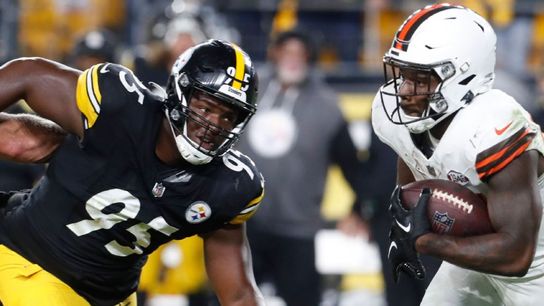 Steelers' DL Keeanu Benton going for a tackle on Browns' Nick Chubb. Steelers' DL Keeanu Benton going for a tackle on Browns' Nick Chubb.