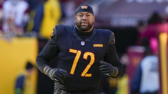 Commanders' Charles Leno Jr. runs onto the field before a game. Steelers' Charles Leno Jr.