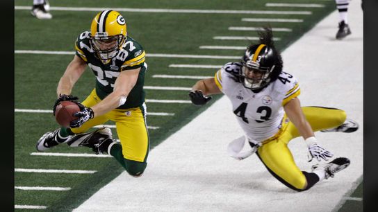 Pittsburgh Steelers' Troy Polamalu watches Green Bay Packers Jordy Nelson (87) try to stay inbounds on catch in third quarter of Super Bowl XLV Pittsburgh Steelers' Troy Polamalu watches Green Bay Packers Jordy Nelson (87) try to stay inbounds on catch in third quarter of Super Bowl XLV