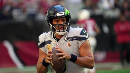 The then Seattle Seahawks QB Russell Wilson drops back to throw a pass during a regular season away football game Steelers' Russell Wilson