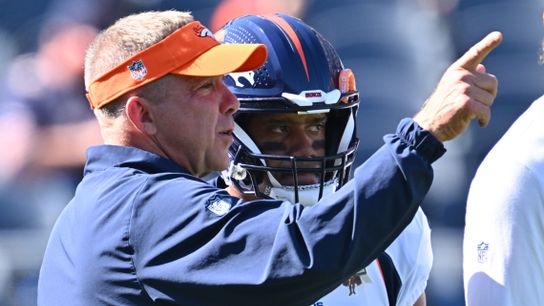 Denver Broncos Head Coach Sean Payton coaching Russell Wilson during an away regular season game Steelers Russell Wilson