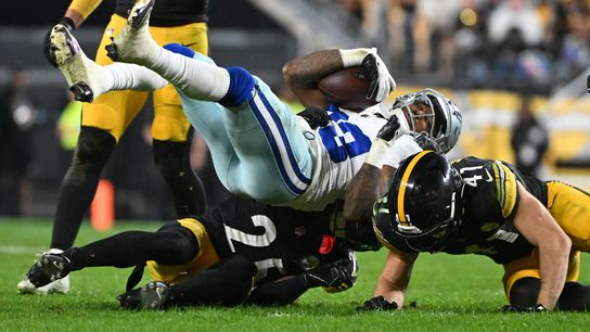 Pittsburgh Steelers' DeShon Elliott and Payton Wilson making a tackle in their loss against the Dallas Cowboys