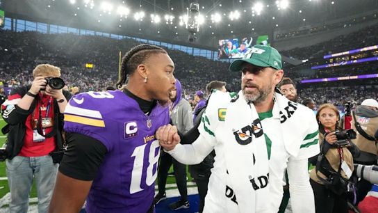 Potential Steelers' quarterback Aaron Rodgers and Vikings' wide receiver Justin Jefferson after a game